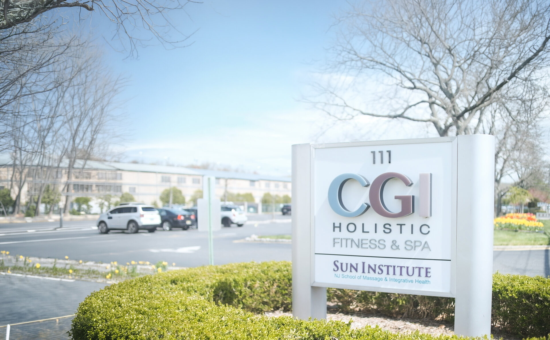 The CGI Holistic Fitness & Spa sign at the Closter, NJ entrance