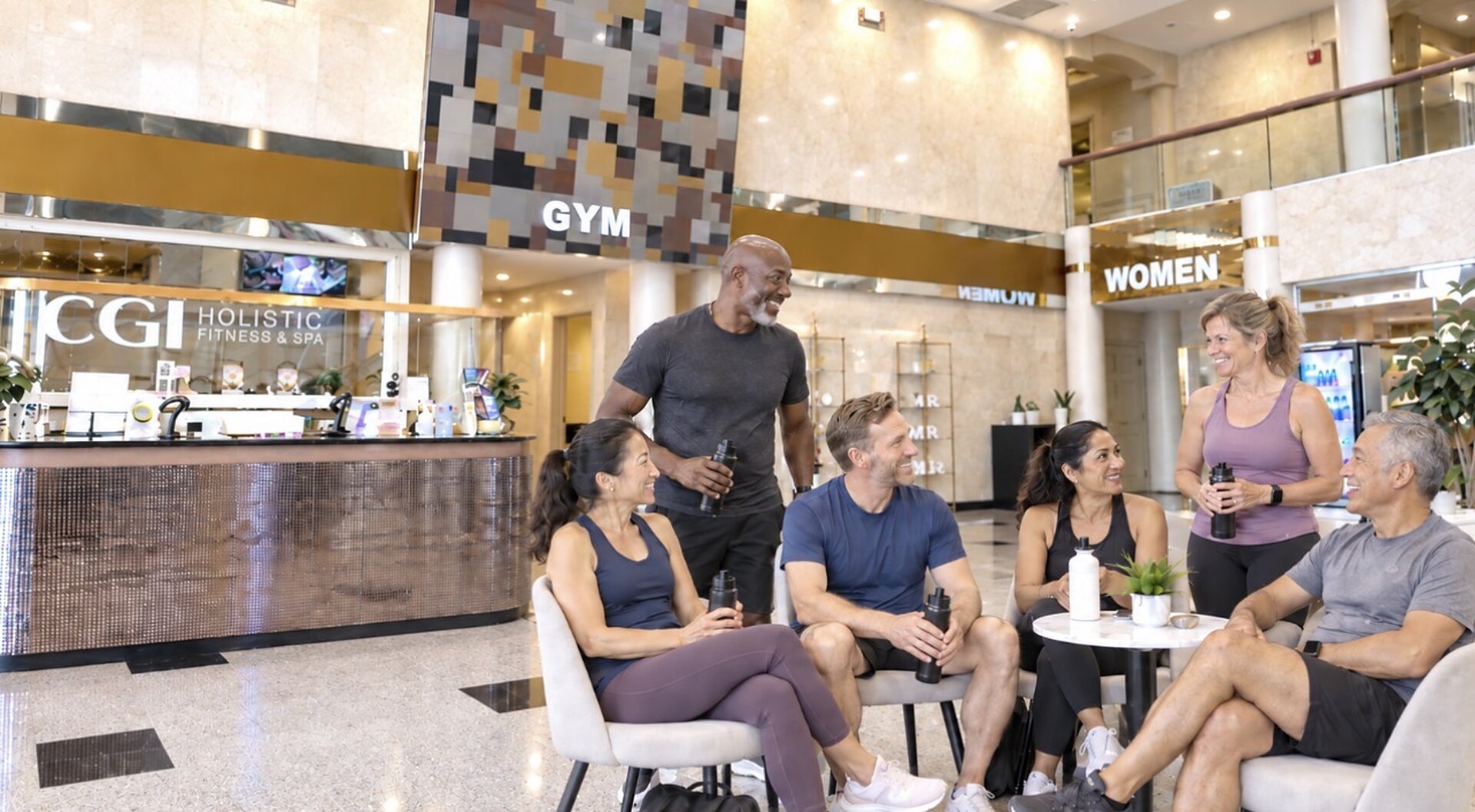 CGI members relaxing together in the lobby after a workout